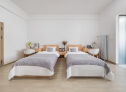 独栋·励业公寓 励业公寓烟台天津南路富士康店 可开票。限时特惠，灵活租期免费停车一居室双床A 开间_励业公寓租房